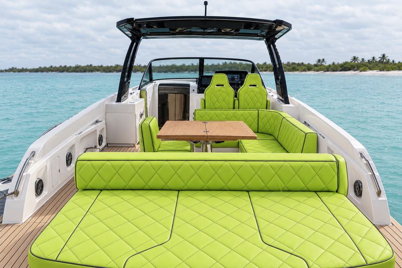 Boat interior in acid lime marine vinyl with graphite diamond quilting