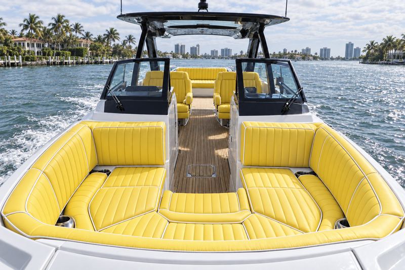 Boat interior in acid lime marine vinyl with graphite diamond quilting