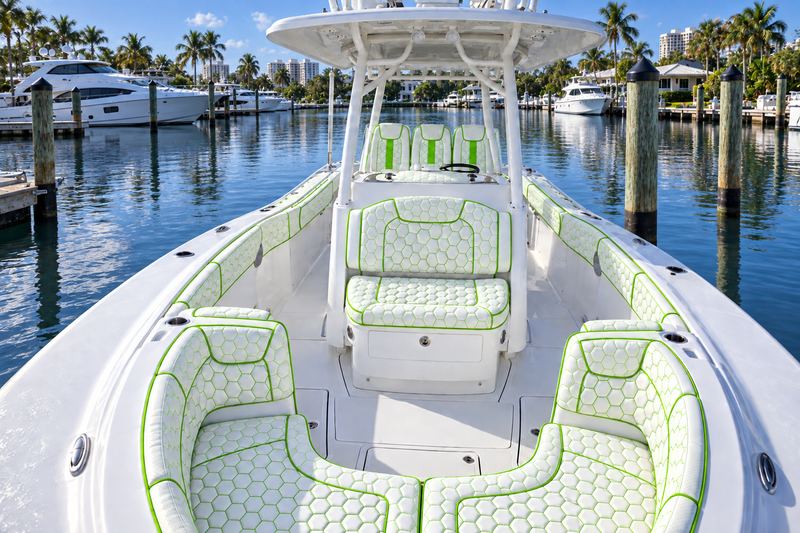 36 ft center console re-covered in ice white with neon green, hex quilting