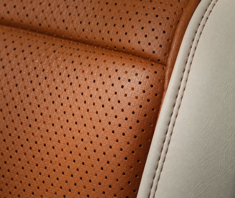 Perforated cognac vinyl beside a cream panel