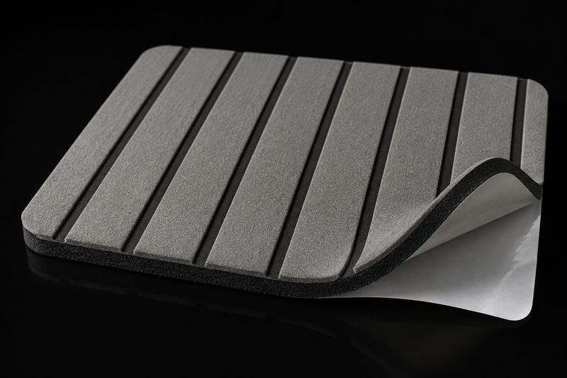 Sheet of grey and black two-layer foam boat decking with routed lines
