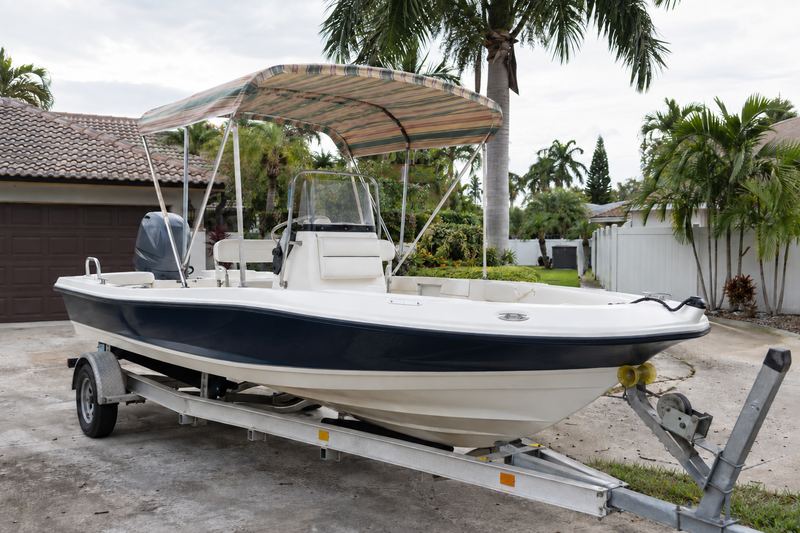 22 ft bay boat, worn bimini top