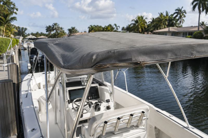 28 ft center console, worn bimini top