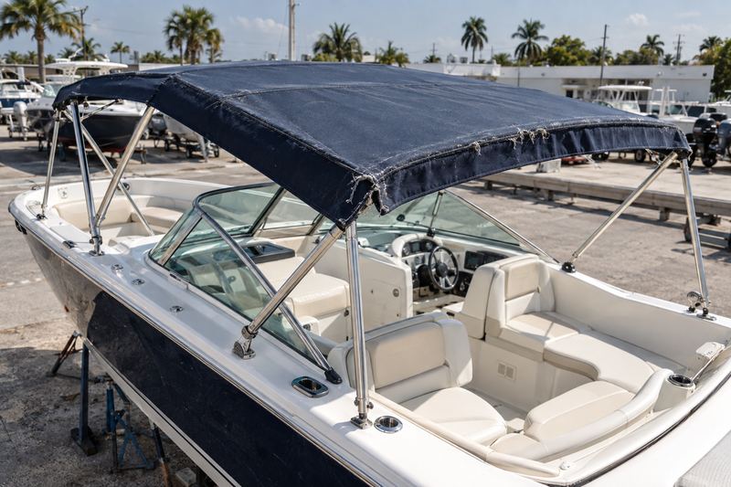 30 ft dual console, worn bimini top