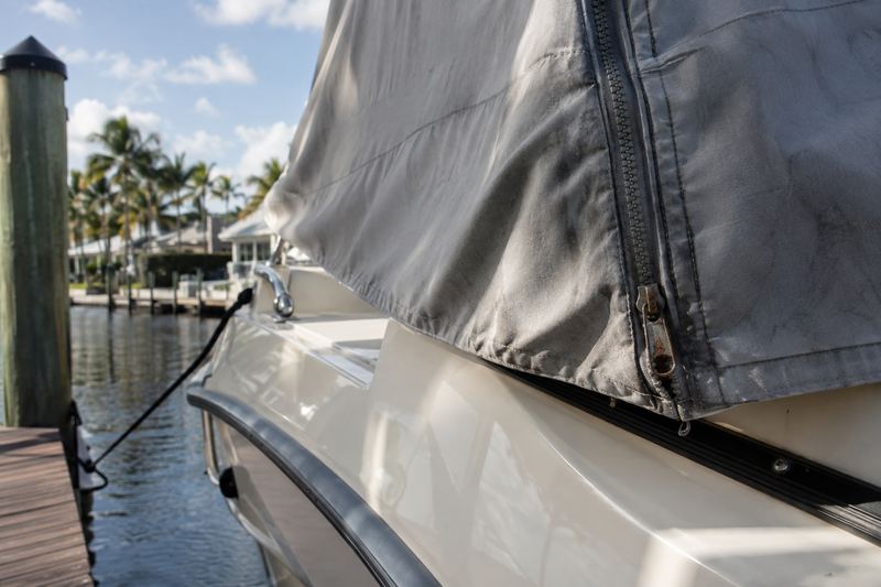 Boat cover with a torn corner