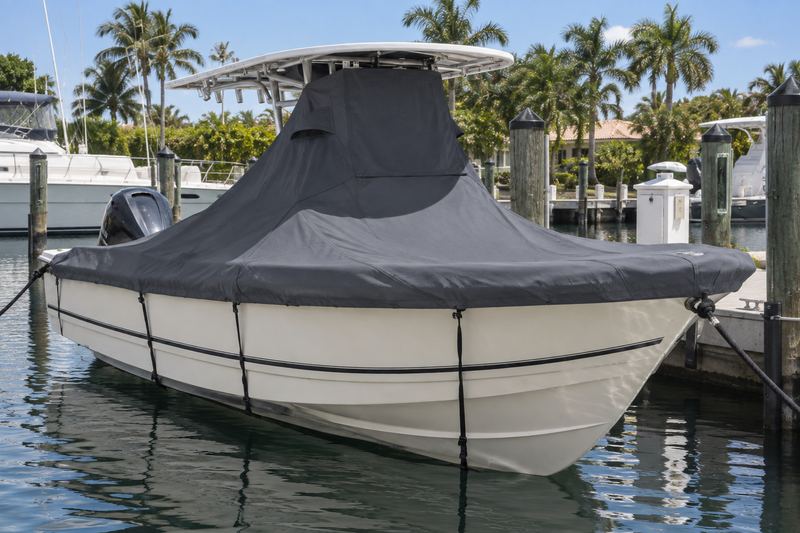 26 ft center console, new fitted charcoal mooring cover