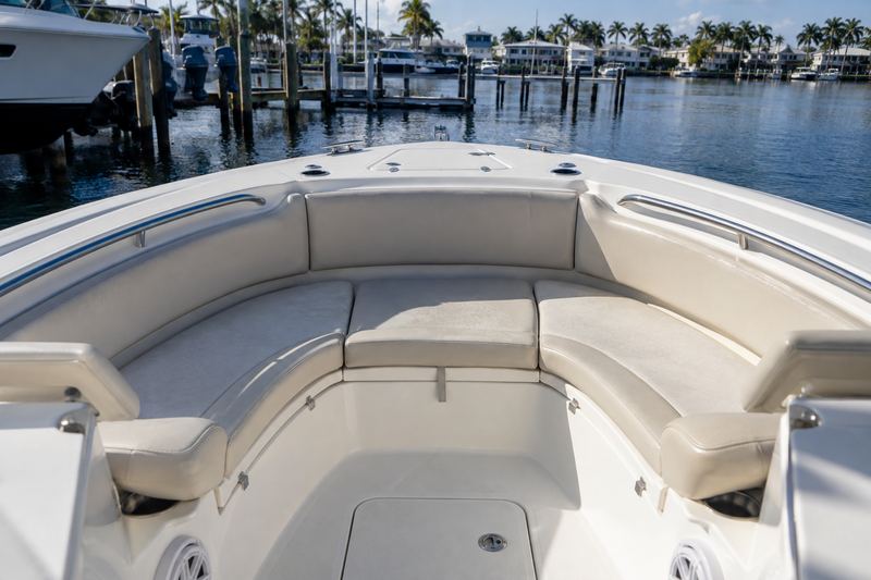 Bow cushions of a 26 ft center console in chalky grey vinyl with mildew spots