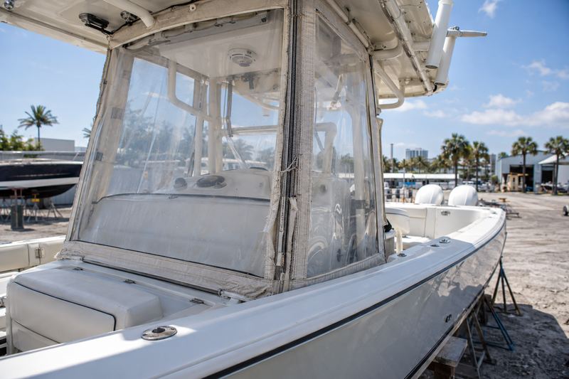 32 ft center console, worn clear enclosure