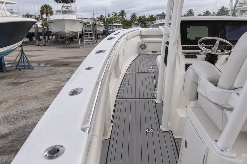 The same deck with new grey and black foam decking with routed lines