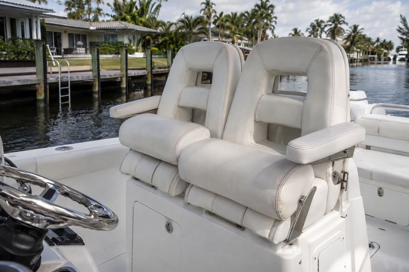 33 ft center console, worn helm seat upholstery