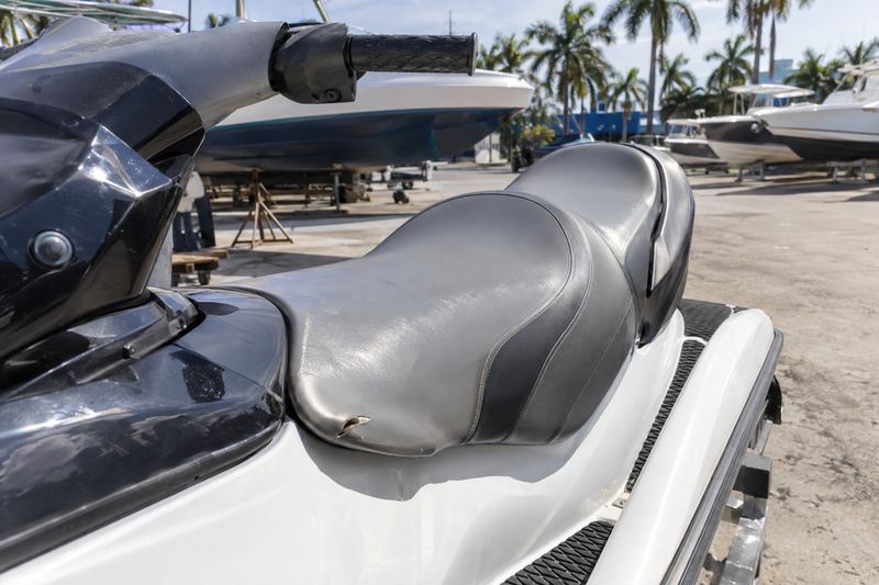 Performance jet ski, worn seat cover