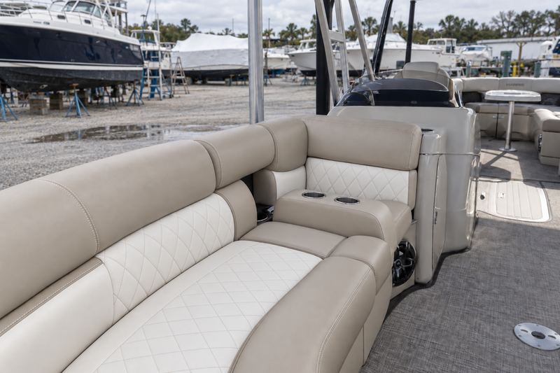 The same lounge seats in sand and white two-tone marine vinyl with diamond stitching