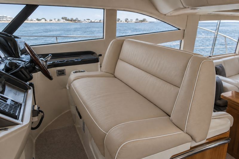 50 ft yacht, new lower helm settee in sand leather