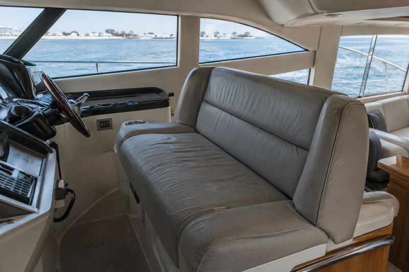 50 ft yacht, worn salon upholstery