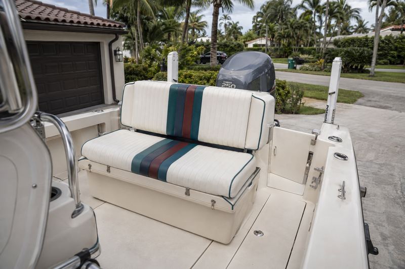 24 ft bay boat, worn seat upholstery