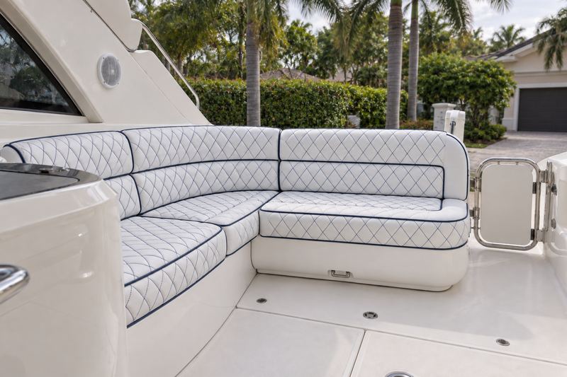 50 ft express yacht, new cockpit lounge in white leather with navy diamond quilting